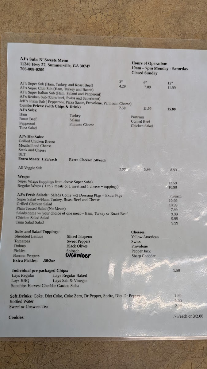 AJ's Subs N'Sweets menu board
