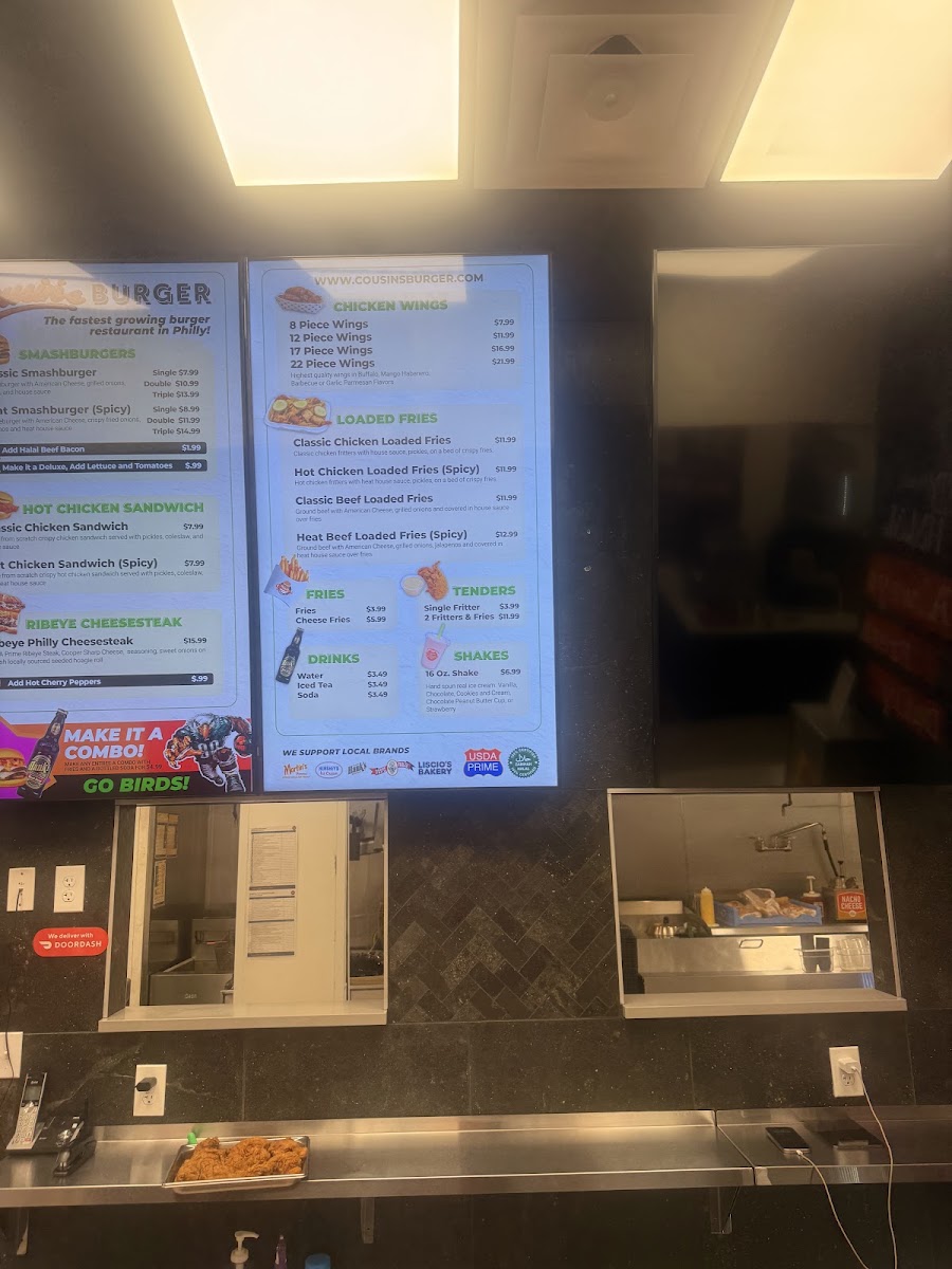 Cousin's Burger menu board
