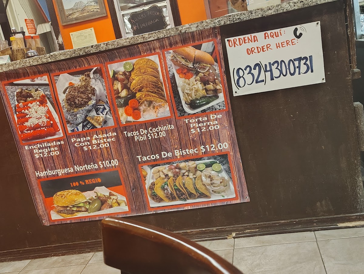 Taqueria La Villa de Nuevo León menu board