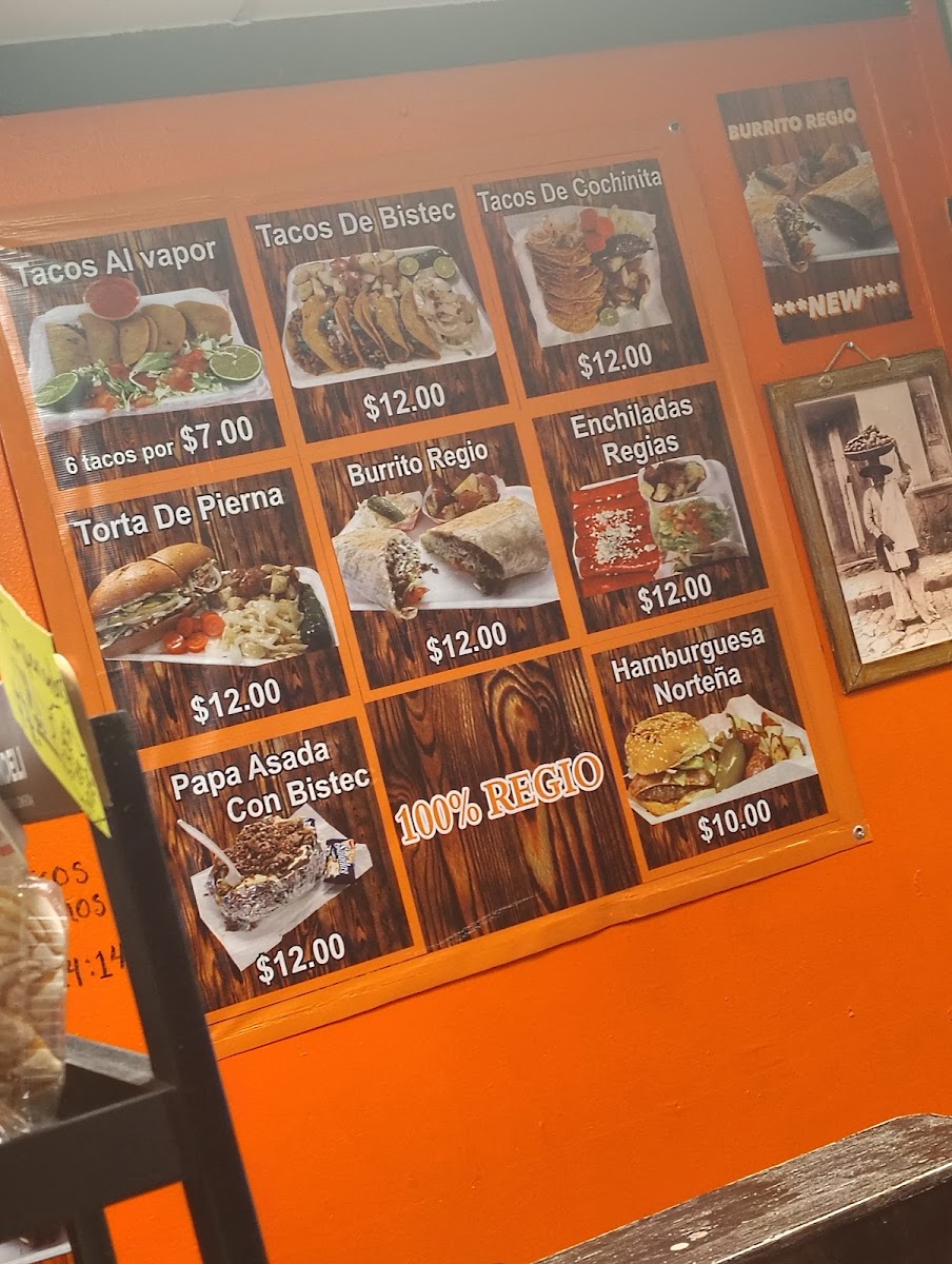 Taqueria La Villa de Nuevo León menu board