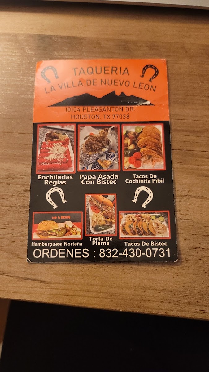Taqueria La Villa de Nuevo León menu board