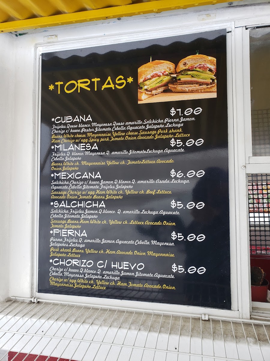 Tacos Roxy menu board