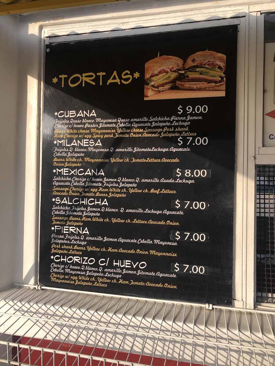 Tacos Roxy menu board