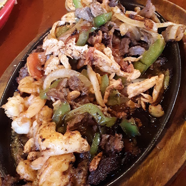 Steak Chicken and Shrimp Fajitas