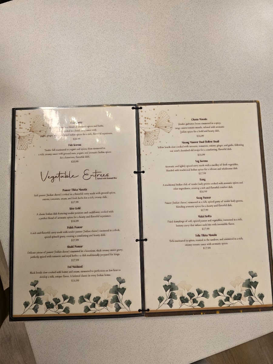 Ticca Tikka Indian Cuisine menu board