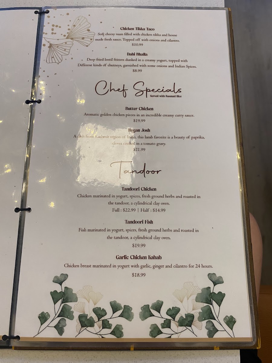 Ticca Tikka Indian Cuisine menu board