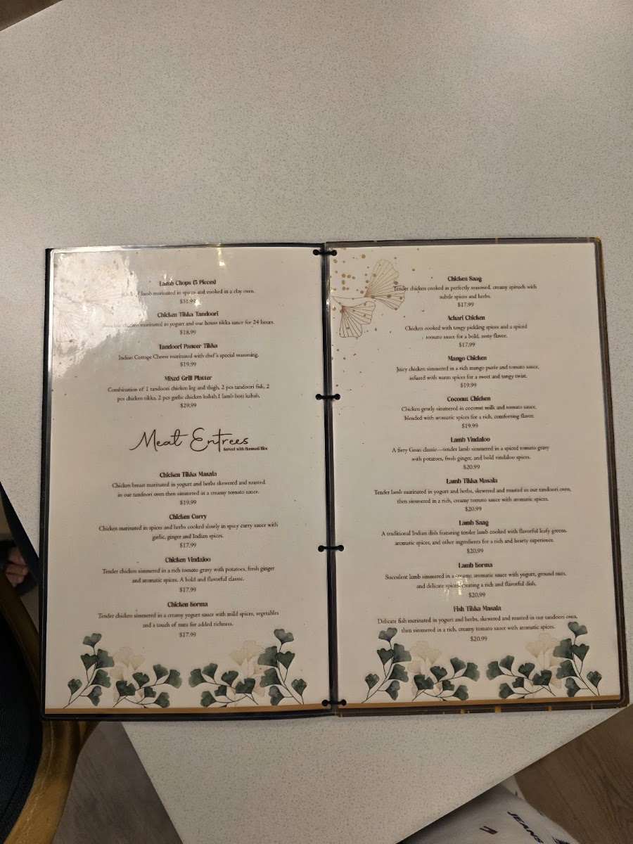 Ticca Tikka Indian Cuisine menu board