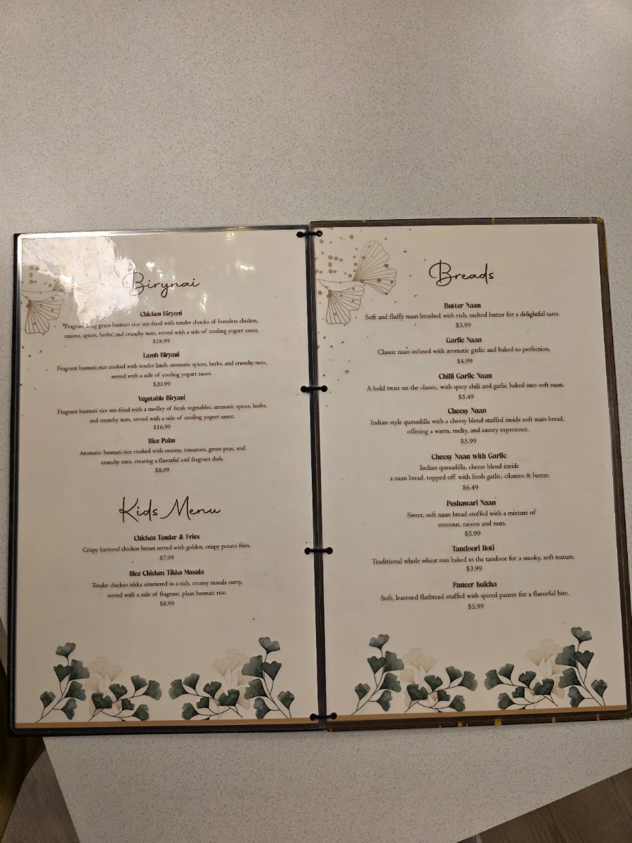 Ticca Tikka Indian Cuisine menu board