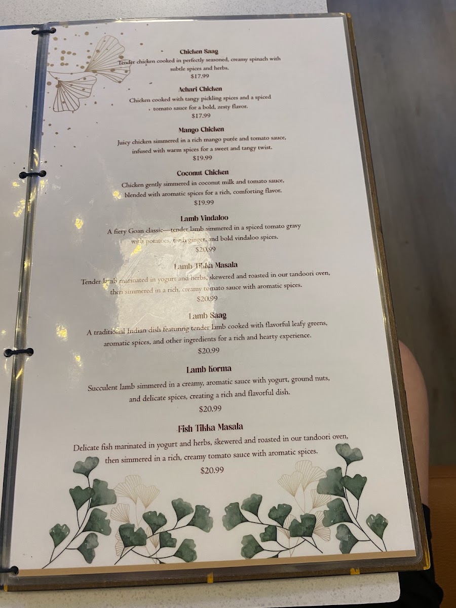 Ticca Tikka Indian Cuisine menu board