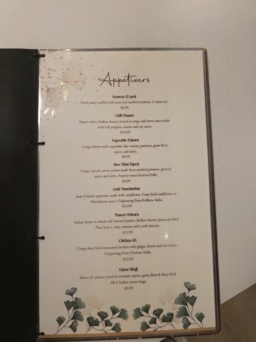 Ticca Tikka Indian Cuisine menu board