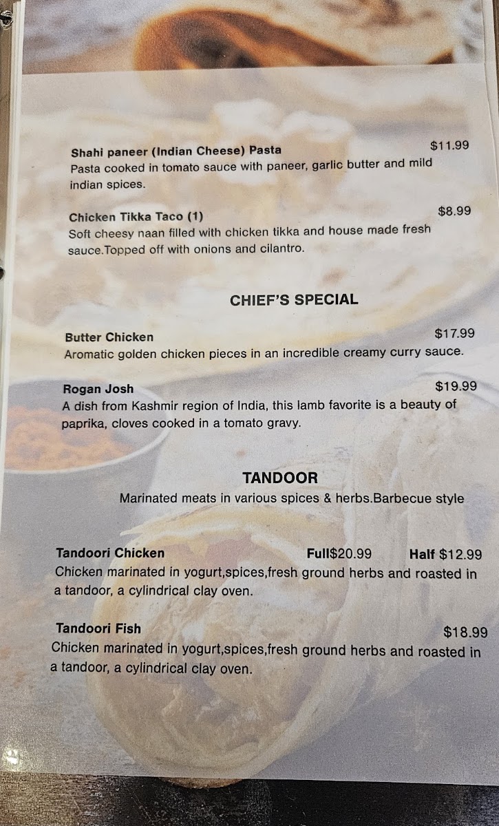 Ticca Tikka Indian Cuisine menu board