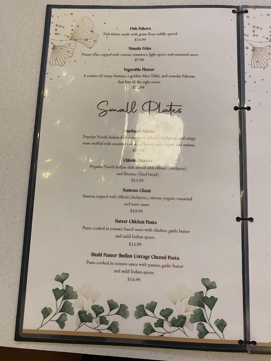 Ticca Tikka Indian Cuisine menu board