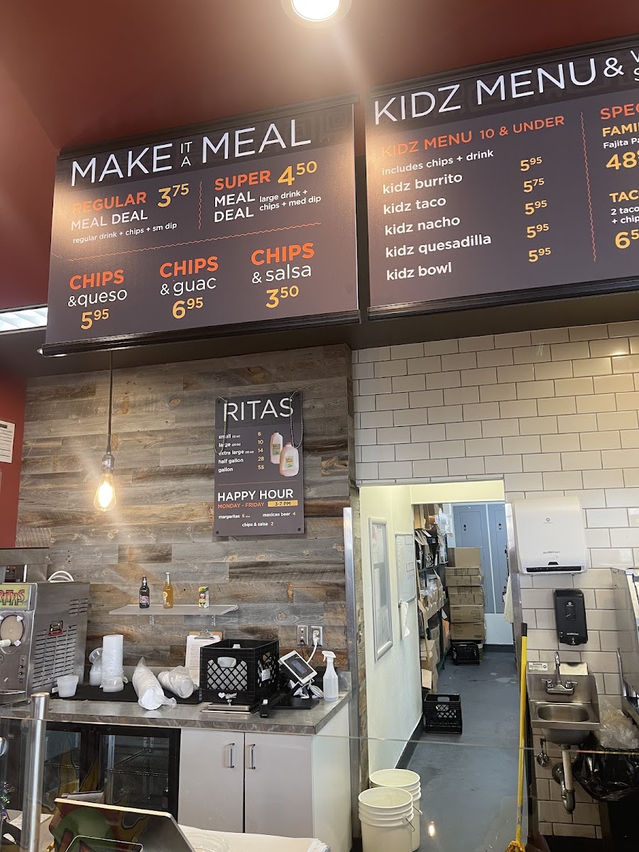 Izzo's Illegal Burrito - Airline Hwy menu board