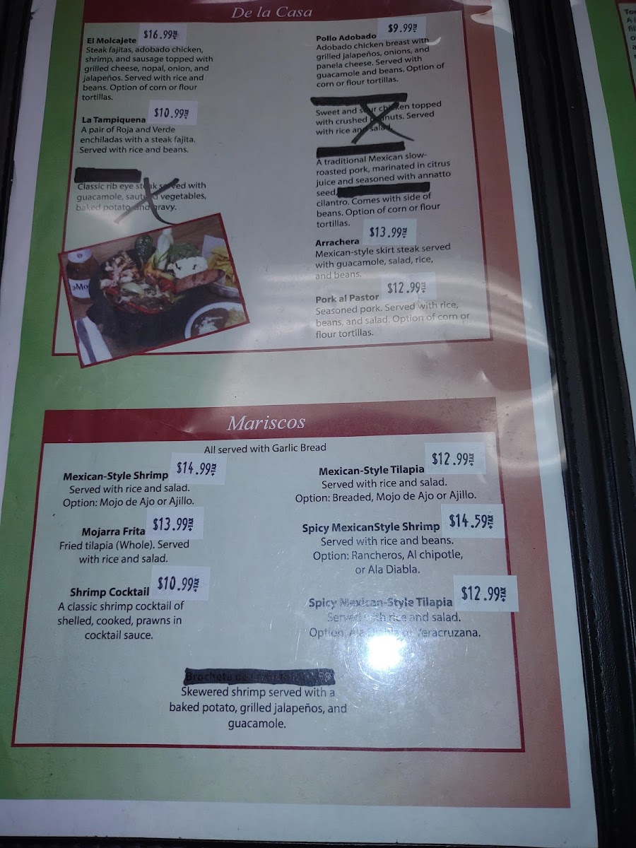 La Malquerida Restaurant & Tienda Avon Park menu board