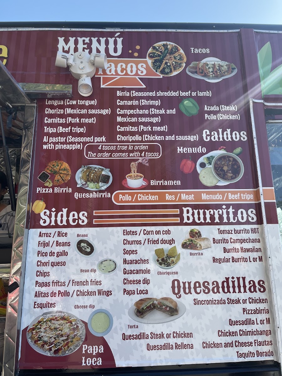 Taqueria Tajumulquense menu board