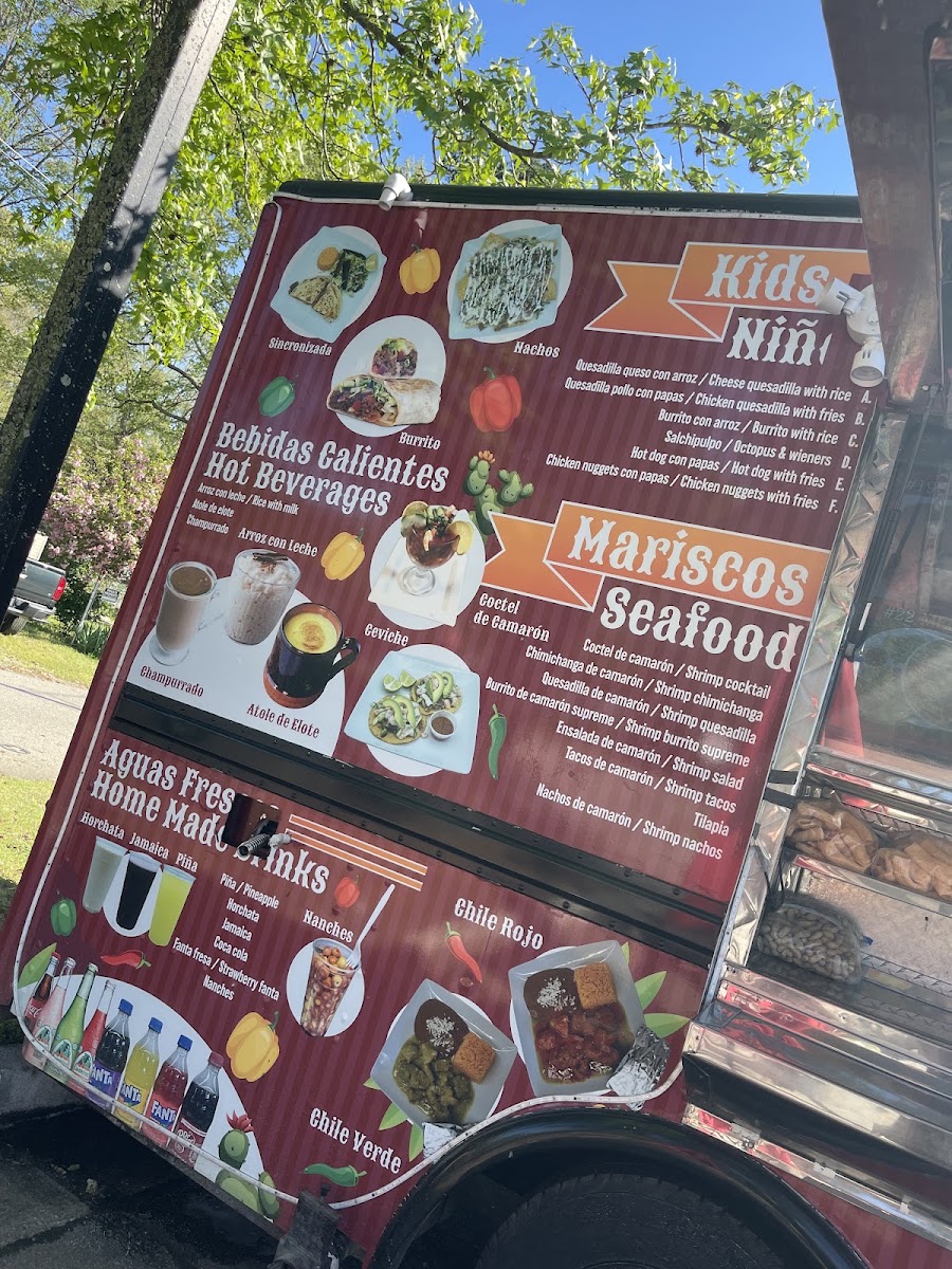 Taqueria Tajumulquense menu board