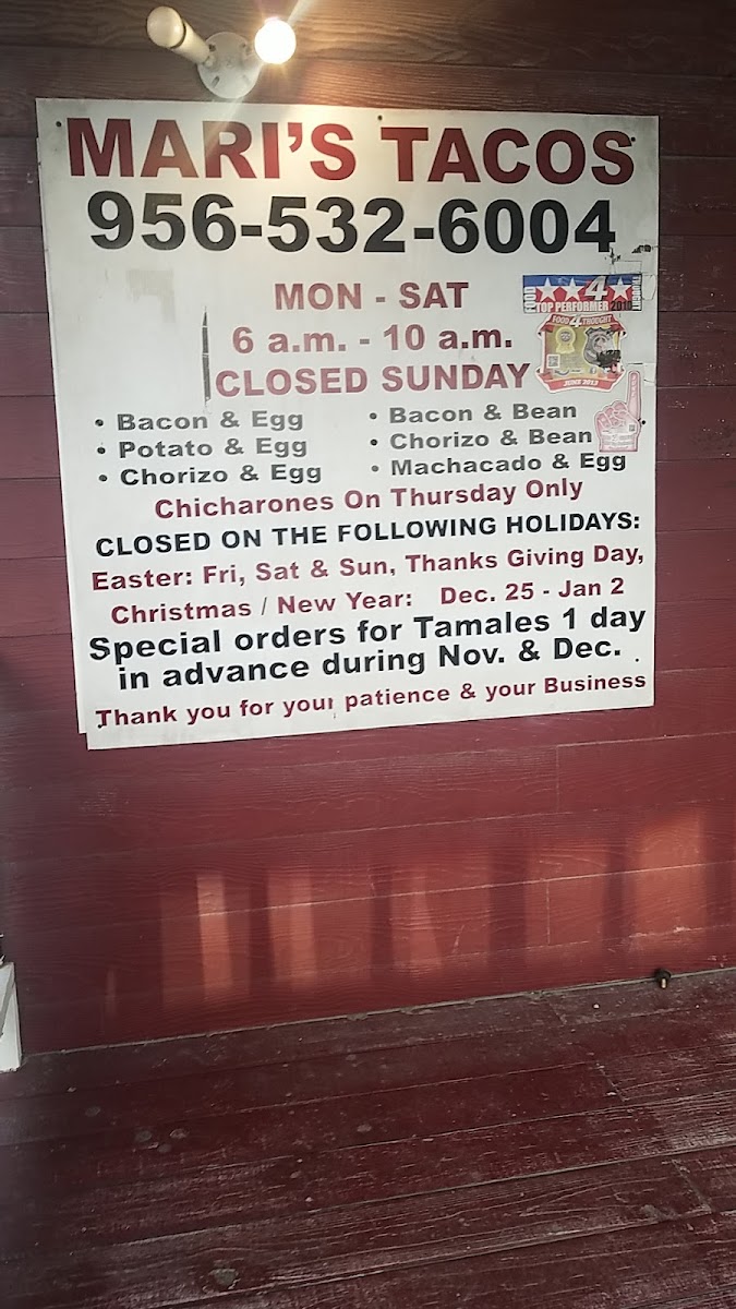 Mari's Tacos menu board