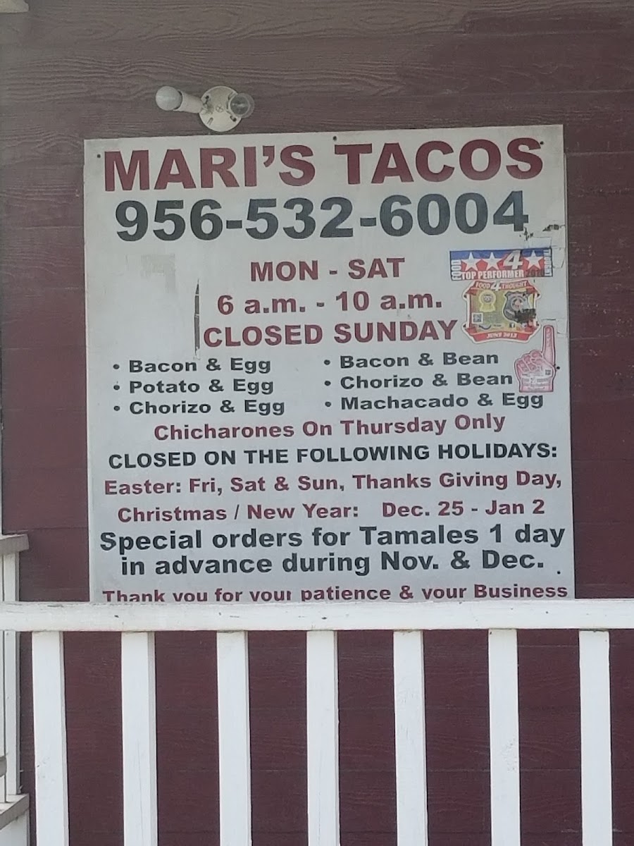 Mari's Tacos menu board
