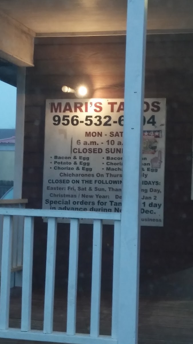 Mari's Tacos menu board