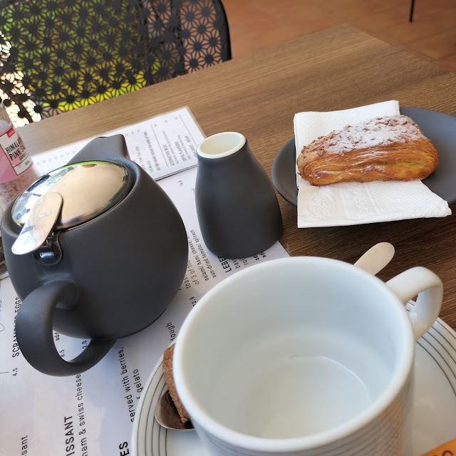 Pastry and Pot of Tea