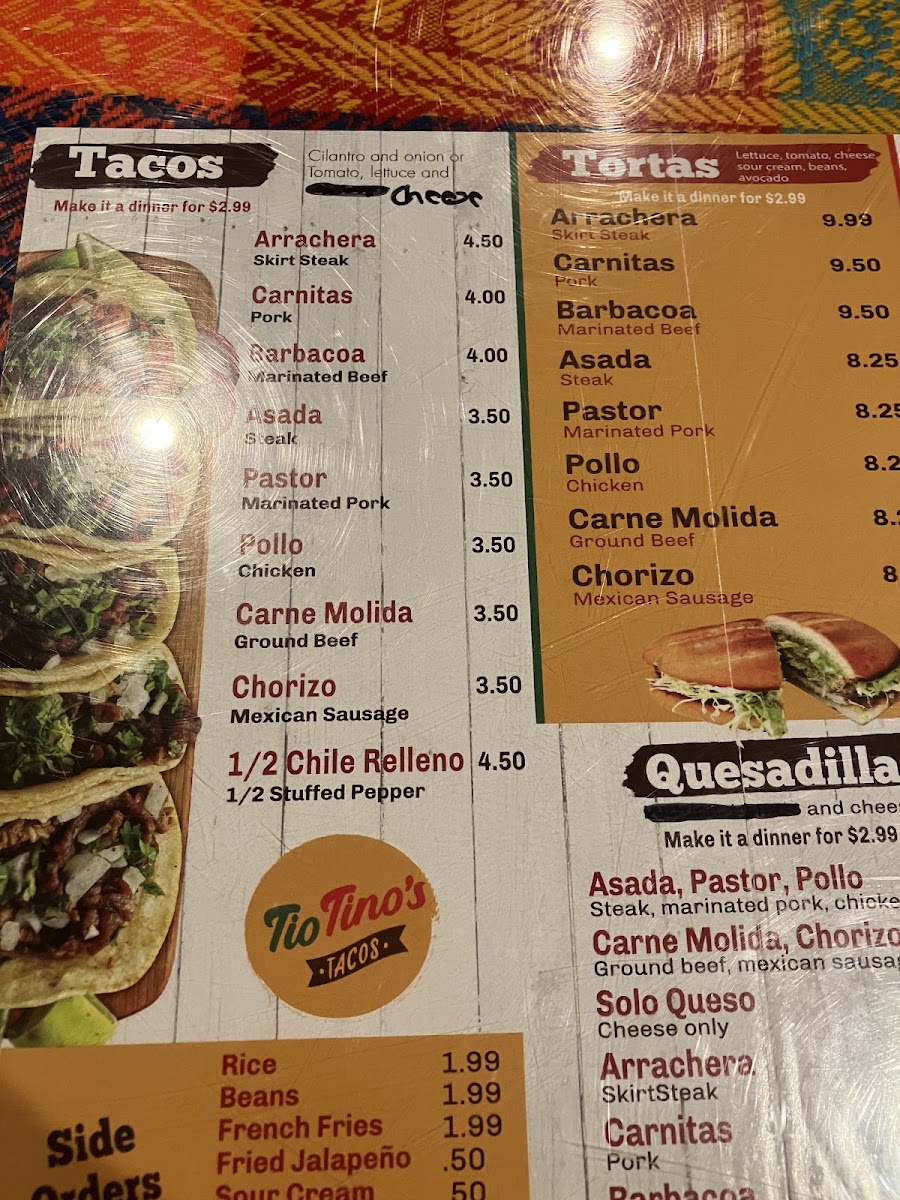 Tio Tino's Tacos menu board