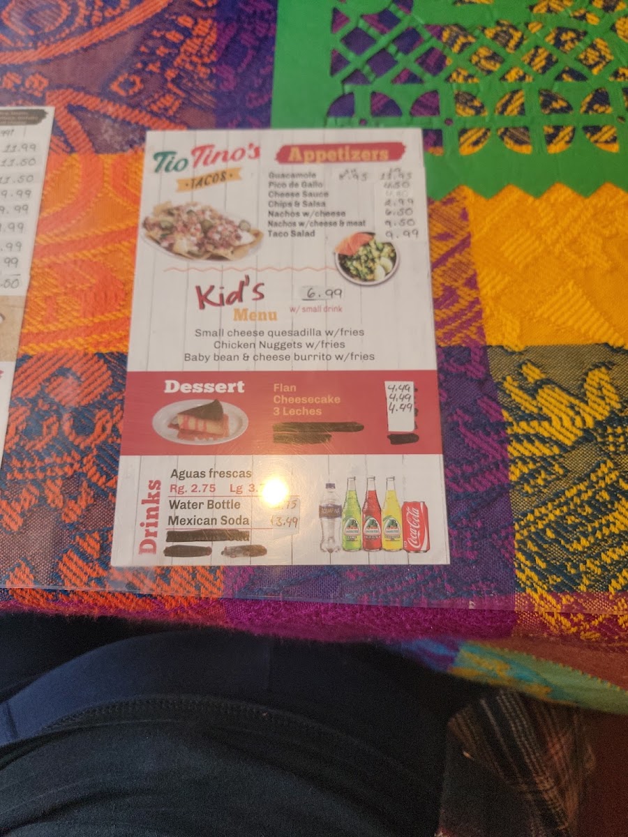 Tio Tino's Tacos menu board