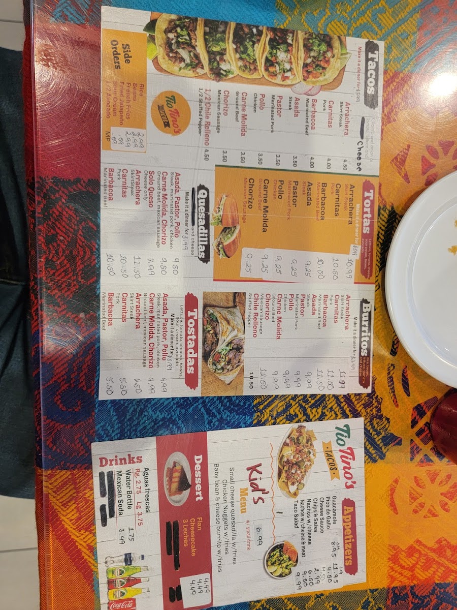 Tio Tino's Tacos menu board