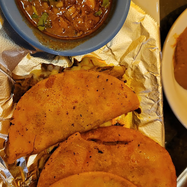Queso Birria Tacos and Consommé