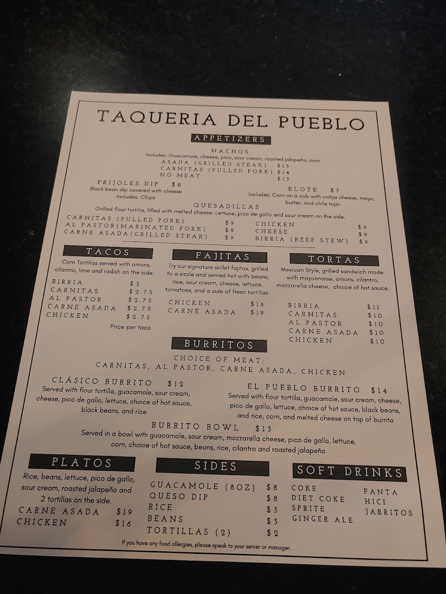 Taqueria Del Pueblo menu board