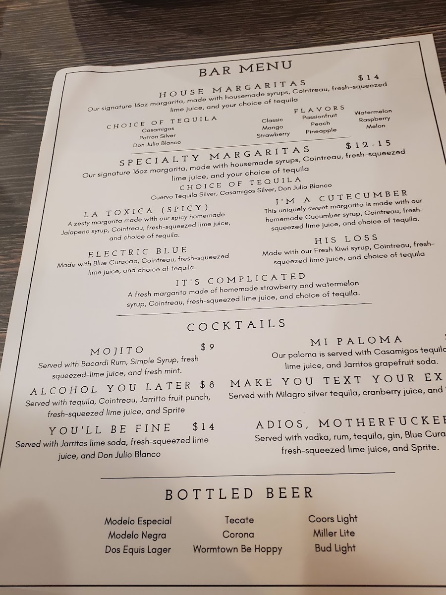 Taqueria Del Pueblo menu board
