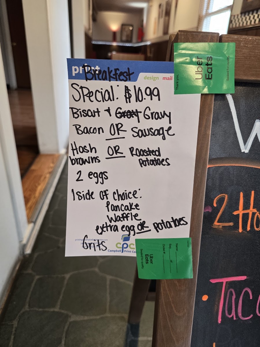 Greedy's Grill menu board