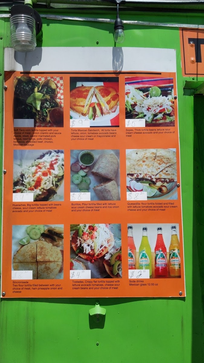 Taquería “ EL ÉXITO “ menu board