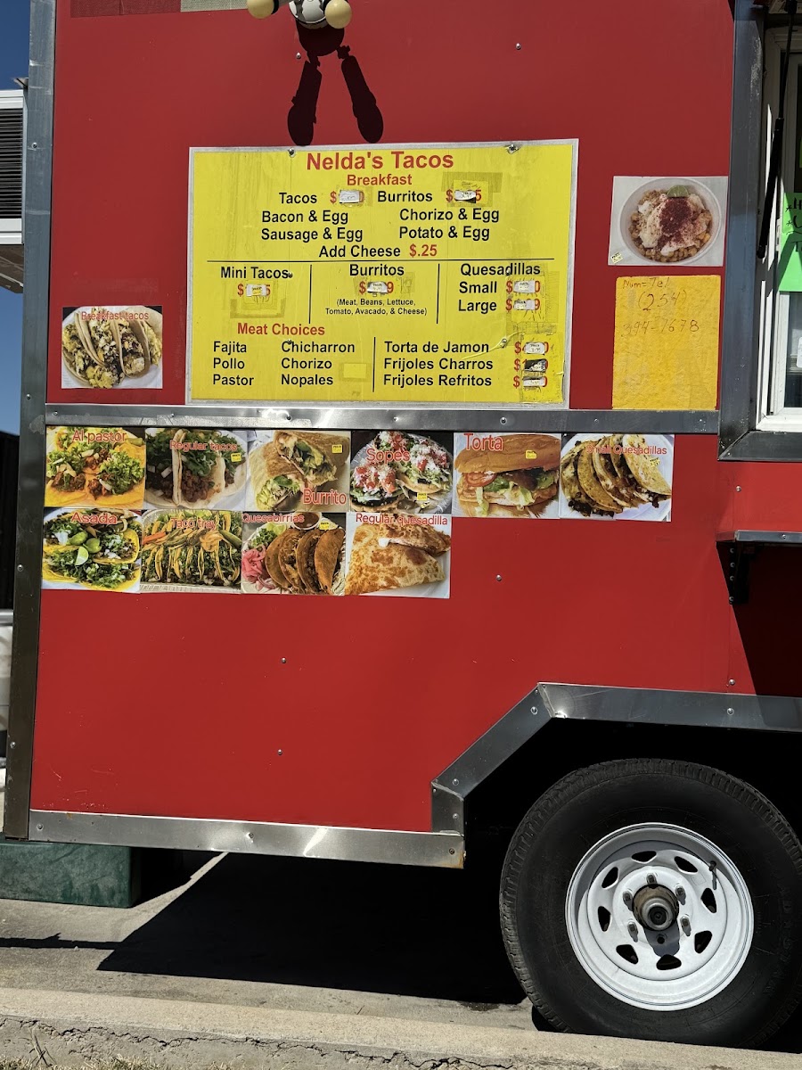 Nelda's Tacos menu board