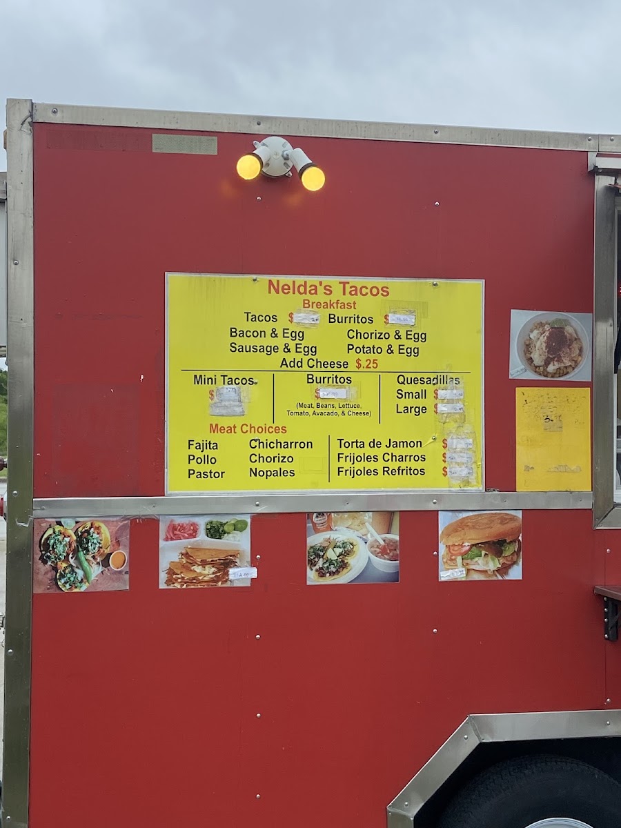 Nelda's Tacos menu board