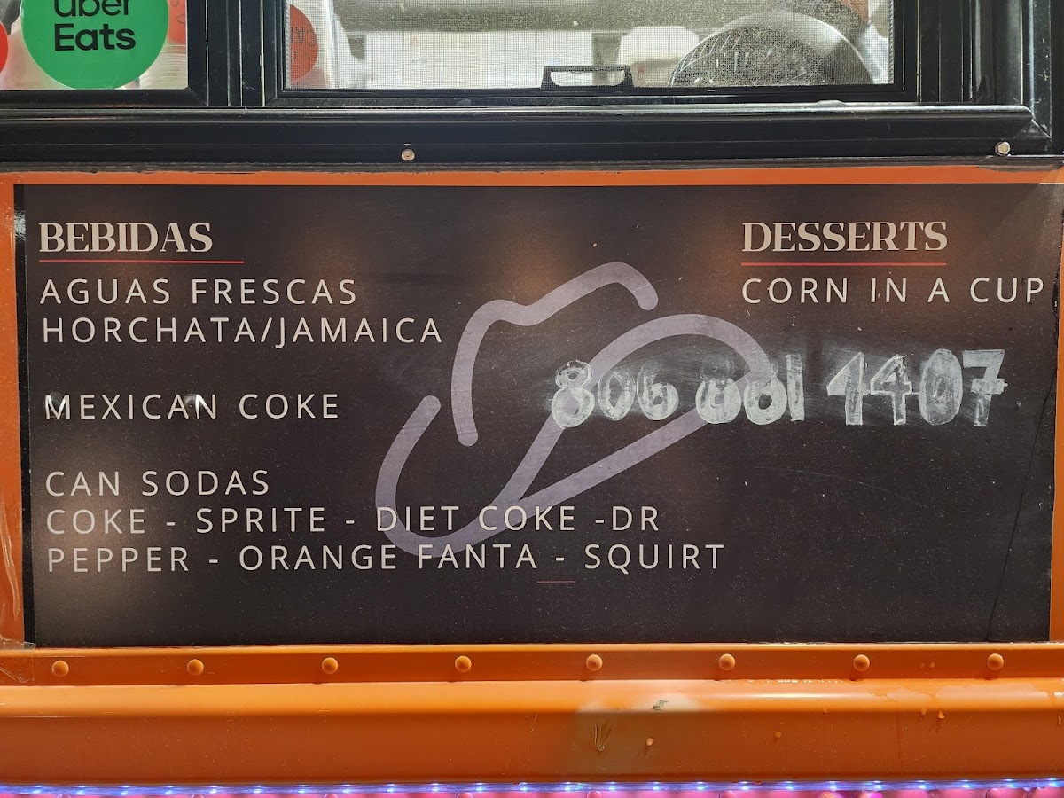 Canelos Taqueria menu board