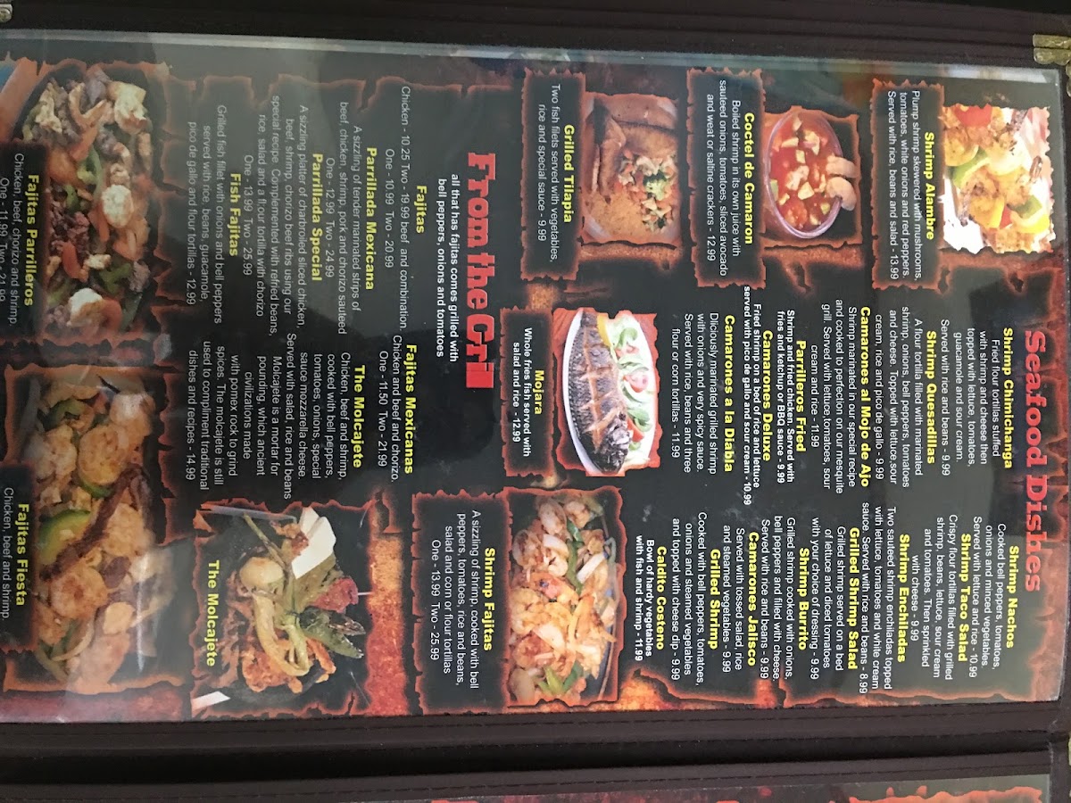Los Parrilleros menu board