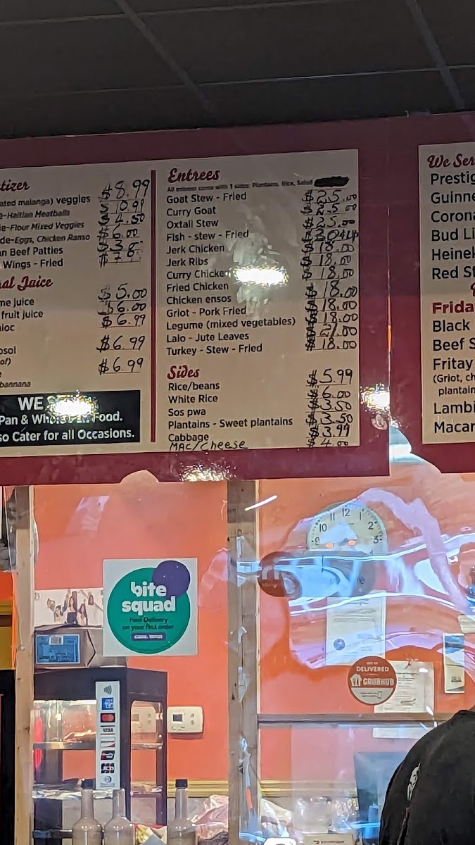 Yummy Yummy Caribbean Food menu board