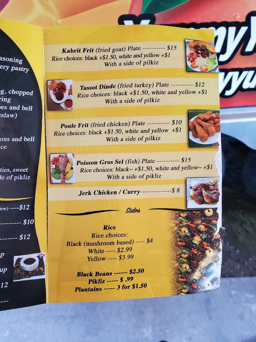 Yummy Yummy Caribbean Food menu board