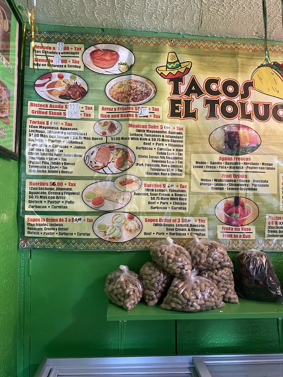 Tacos El Toluco menu board
