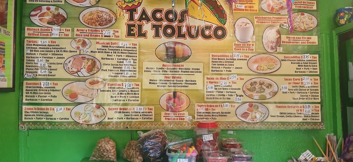 Tacos El Toluco menu board