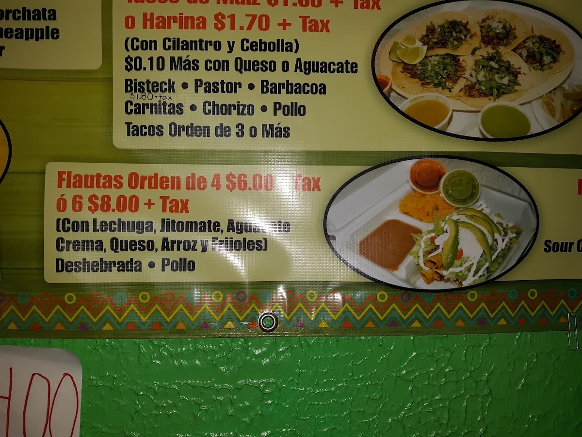 Tacos El Toluco menu board