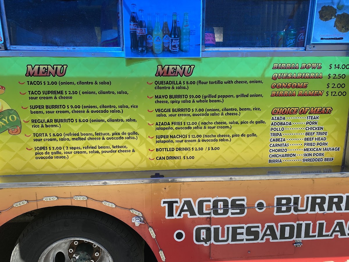 Birria y tacos El Mayo menu board