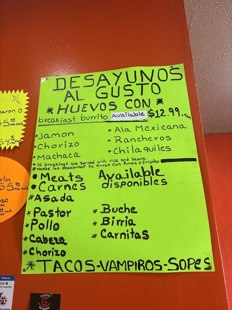Tacos y mariscos Mendoza menu board