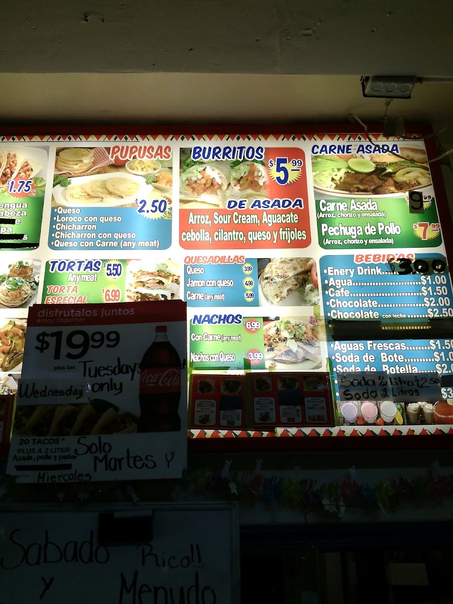Tacos y mariscos Mendoza menu board