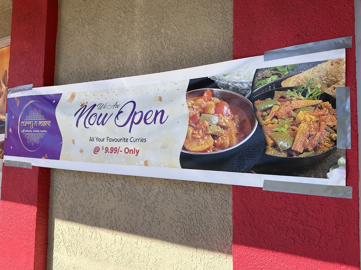 Curry N More menu board