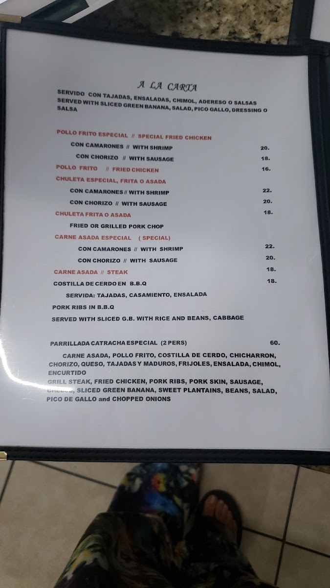 Green Banana Restaurante Hondureño menu board