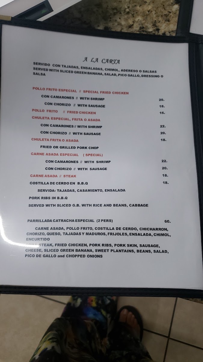 Green Banana Restaurante Hondureño menu board