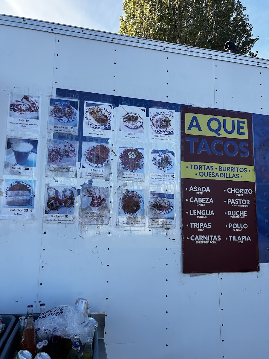 A Que Tacos menu board