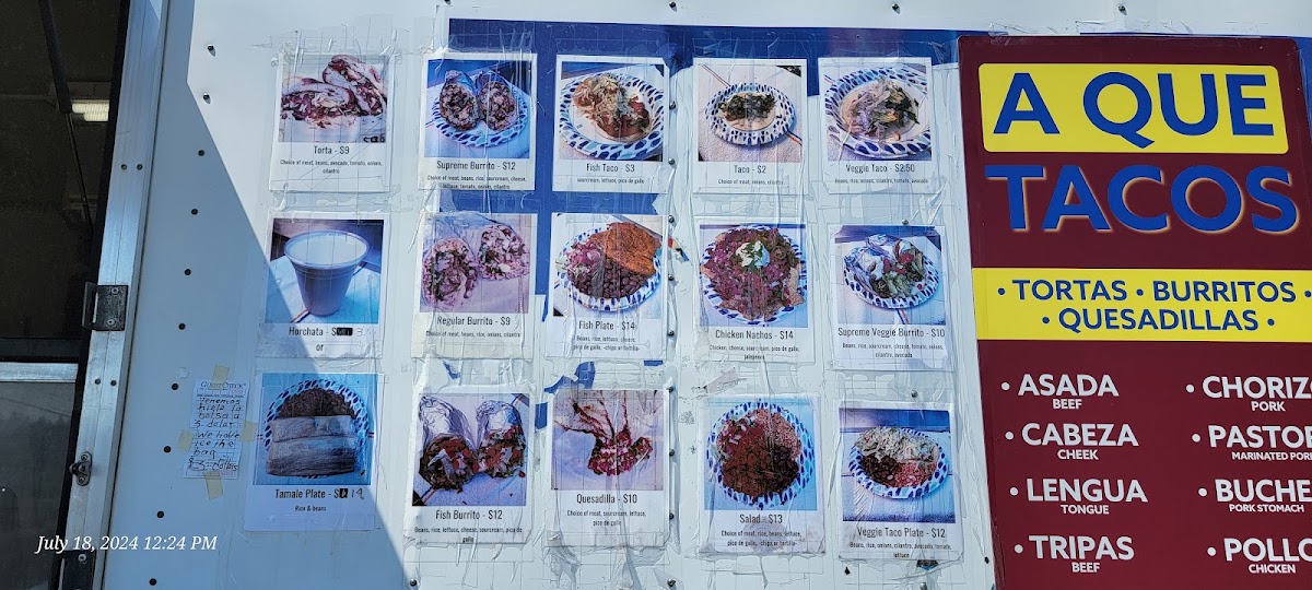 A Que Tacos menu board