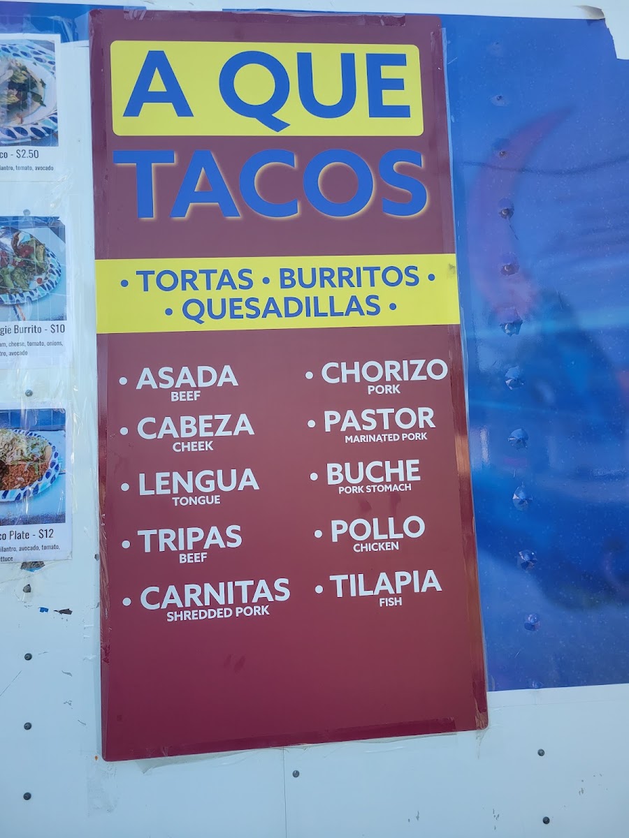 A Que Tacos menu board